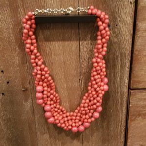 Beaded and intertwined necklace